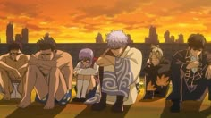 an anime scene with many people sitting on the ground and one person standing in front of them