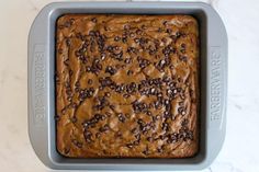 chocolate chip cake in a pan on a counter