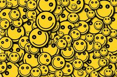 many yellow smiley faces are grouped together