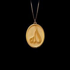 Elevate your faith with our gold Allah pendant. This solid gold necklace showcases exquisite craftsmanship, symbolizing Islamic faith and devotion. The Allah pendant is more than just jewelry; it's a fine representation of faith and spirituality. PENDANT INFORMATIONThis pendant is made of real, solid gold.• Made in USA• Material: 14k or 18k solid gold• Finish: polished• Height: 1.25 (31,5 mm) x Width: 0.85" (22 mm)• Pendant weight: approx. 5 grams (14k)• Bail: fits up to 4 mm chains• Solid back, Allah Pendant, Solid Gold Necklace, Solid Gold Chains, Mini Pendants, Yellow Gold Pendants, Elegant Jewelry, Gold Pendant, Gold Finish, Handcrafted Jewelry