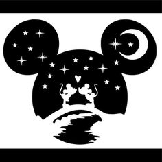 mickey mouse silhouette with stars and moon in the background