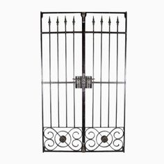 an iron gate with wrought bars on the top and bottom, against a white background