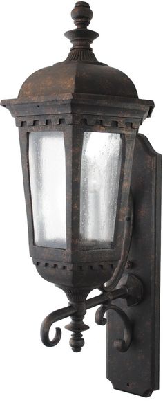 an old fashioned wall light with frosted glass on the front and side panels,