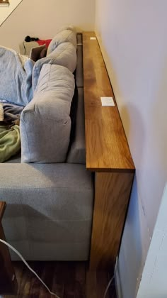 Hickory wood with light stain and finished with a polyurethane coating. Wired in two outlets using a remodeling outlet box and standard plugs from local hardware store. Couch Cleaning, Cleaning Furniture, Diy Dorm, Fabric Couch, Diy Living Room Furniture, Diy Furniture Cheap, Latest Kitchen Designs, Diy Cushions