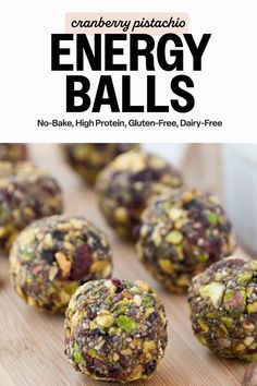 energy balls on a cutting board with text overlay that reads, cranberry pistachio energy balls