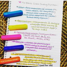 some writing on a piece of paper with colored markers next to it and the words, my bible coloring system