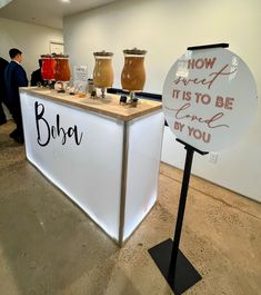 a sign that says how sweet it is to be served by you on the counter