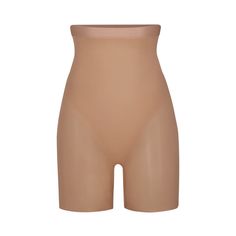 The perfect light-compression shapewear short style for underneath skirts and dresses. It’s made with double-layered fabric, a thin waistband, and raw c... Compression Shapewear, Mid Thigh Shorts, Layered Fabric, Skirts And Dresses, Short Torso, And Dresses, T Shirt Bra, Shapewear, I Dress