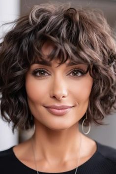 Sophisticated curly bob with bangs is a perfect curly hairstyle for mature ladies who would like to exhibit their fun side. In this bob cut, the face is clearly flourished, and hence, it is appropriate for pinpointing some brilliant aspects of your facial appearance. Click here to check out more best curly hairstyles for women over 50. Hair Styles For Short To Medium Hair, Short Wavy Bob With Bangs Over 50, Curly Bob With Fringe Fine Hair, Curly Hairstyles For Double Chin Faces, Curly Shag With Bangs Over 40, Over 50 Wavy Hairstyles For Women, Wash And Go Curly Hair Styles, Short Curly Bob Hairstyles Over 50, Curly Hairstyles With Fringe