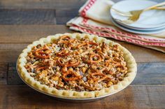 a pie sitting on top of a wooden table