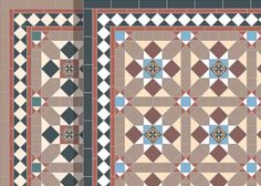 two tiles with different colors and designs on them