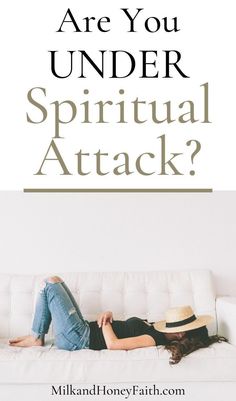 a woman laying on top of a white couch with the words are you under spiritual attack?