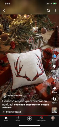 the christmas tree is decorated with red and white decorations