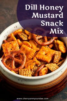 homemade dill honey mustard snack mix in a bowl with the title overlaying