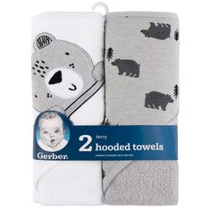 two hooded towels with bears on them and one has a baby's head in the middle