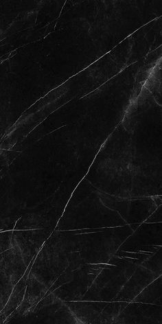 a black marble textured background with white lines