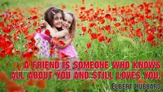 two girls hugging each other in a field of red flowers with an inspirational quote about friends