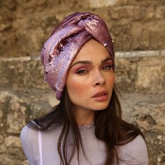 This sequin Turban is a statement piece perfect for accompanying your holiday and special occasion outfits. Featuring a gorgeous wavy detail that adds dimension and subtly steals the show with its soft blush color, this unique turban is bound to get those compliments rolling.  The best part? This turban is designed to be worn 'as is'!  Each turban was designed with comfort, style, and wearability in mind, so there is absolutely no trying or closing involved. Simply place the turban on your head Bohemian Headwrap Headband For Party, Bohemian Party Headband Headwrap, Elegant Party Headband Headscarf, Elegant Party Headscarf Headband, One Size Party Headband Headscarf, One Size Party Headscarf Headband, Elegant Pink Turban For Party, Party Headband Headwrap One Size, Party Headwrap In Headband Style