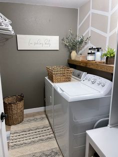 a washer and dryer in a small room