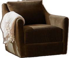 a brown chair with a white blanket on it's back and armrests