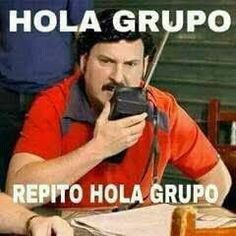 a man sitting at a table with a cell phone in his hand and the caption reads, hola grupo repito hola grupo