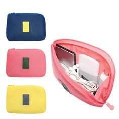 four different colored cases with cords and wires in them, one is pink, the other is blue