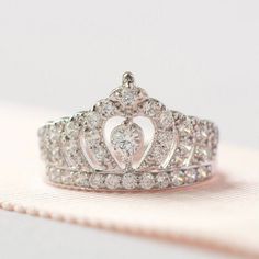 a princess's tiara is shown on top of a table