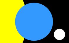 a black, yellow and blue background with two circles on the same color as each other