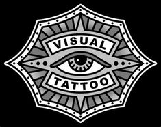 an eye with the word visual tattoo on it's side, in front of a black background