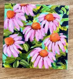 an acrylic painting of pink daisies