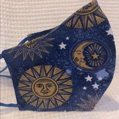 Handcrafted Sun & Moon Print Cloth Face Mask. -4 Layers With 2 Layers Of 100% Cotton And 2 Layers Lightweight Interfacing. -Elastic Ear Loops, Adjustable -Reversible -Machine Washable And Reusable -Adult Size *Print Placement May Vary Moon Face, Handcrafted Accessories, Moon Print, Cloth Face Mask, Print Placement, Ear Loop, Sun Moon, Blue Gold, Face Mask