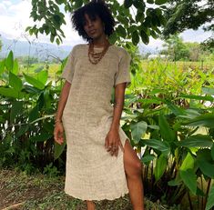 Organic Clothing, Summer Hemp Dress, Long Knitted Dress Express shipping from Thailand. Take 4-7 days worldwide. 100% Hand knitted dress made from pure hemp yarn, natural color,  unbleached and undyed. Beautiful Slip dress. Free size Sizing : Chest  40" Stretched up to 45" Hip max 43" Pit to pit 21" across Armhole 18" Description: Beautiful hand knitted pure hemp dress. Stunning handmade detail and texture. Made from 100% natural hemp yarn. Unbleached and undyed Simple round neck, Loose volumed short sleeves. A line body part. Long slid on both sides. Eco friendly, Organic and fully handmade. One of a kind unique item. ---------------------------------------------------------------------------------------------------------------------------------------------------- Washing instruction: Pre Boho Crochet Dress, Crochet Dress Boho, Hemp Dress, Hand Knitted Dress, Hemp Yarn, Hemp Clothing, Eco Clothing, Long Knitted Dress, Clothing Summer