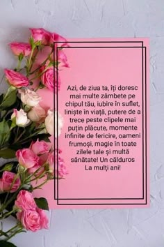 pink roses are in front of a card with the poem azi, de zita, fil doresc mai multute zambete pe chutu