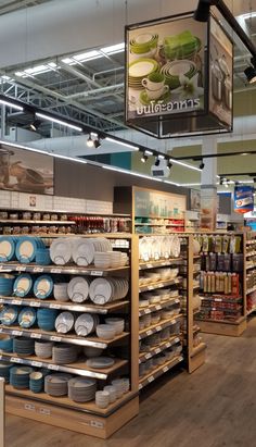 a store filled with lots of plates and bowls