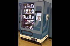 a vending machine sitting inside of a building