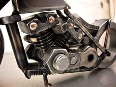 a close up of a motorcycle engine on a table