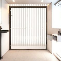 a modern bathroom with white walls and flooring