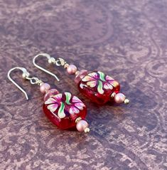 Floral Painted Art Glass Earrings With Swarovski Pearls, Czech Pressed Glass, and Sterling Silver - Etsy Handmade Pink Czech Glass Jewelry, Hand-painted Czech Glass Jewelry Gift, Hand Painted Czech Glass Jewelry Gift, Hand Painted Czech Glass Jewelry For Gift, Handmade Pink Glass Jewelry, Red Hand-painted Flower Earrings For Gifts, Elegant Red Hand Painted Jewelry, Hand Painted Red Dangle Jewelry, Red Hand Painted Dangle Jewelry