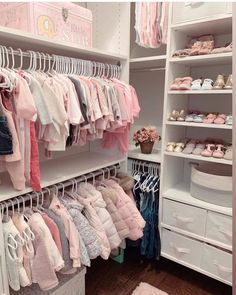 a closet filled with lots of baby clothes