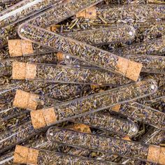 a pile of wine corks with lavender sprigs on them