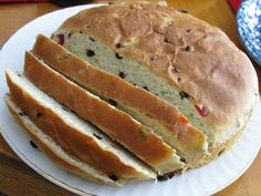 a loaf of bread sitting on top of a white plate