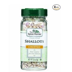 the spice hunter shallots chopped in a glass jar with green lid on white background