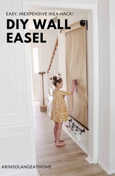 Using a few items from IKEA make a DIY wall mounted easel that your whole family will love. It is a space saver and looks great, from lifestyle blogger Arin Solange at Home. Art Wall Kids Playroom, Ikea Kids Bedrooms, Playroom Room Divider, Kids Playroom Art Area, Art Wall Playroom, Mural Wall Art Kids Rooms, Art Wall Kids Room, Craft And Playroom Room Ideas, Hallway Play Area