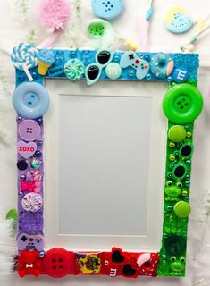 a colorful frame with buttons on it