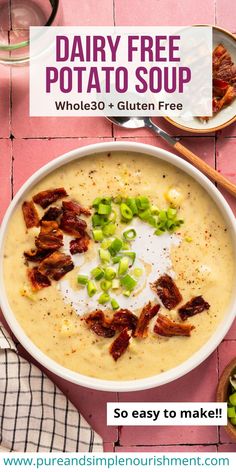 dairy free potato soup with bacon and green onions in a bowl on a pink table