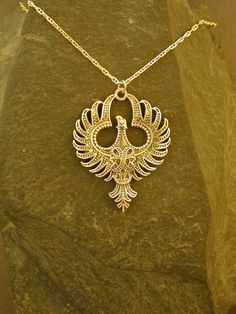 "This  Phoenix pendant is 14K Gold. The included chain is a 14K Gold FLM 13Y chain. You may choose 16, 18 or 20 inch at the same price. Other length available at sightly higher prices. This Phoenix pendant measures 1 7/8\" tall by 1 3/8\" across. I hand cast all my pieces using the lost wax casting method. Please ask your needs. You may call me with questions, often I am out so please use my machine. 831-476-3176. Satisfaction Guaranteed! I send items USPS First Class unless otherwise directed. Silver Filigree Necklace In 14k Gold, Ornate Gold Sterling Silver Jewelry, Sterling Silver Necklace With Intricate Design In Yellow Gold, Gold Filigree Sterling Silver Necklaces, 14k Gold Pendant Necklace With Intricate Design, Phoenix Valorant, Jellyfish Pendant, Phoenix Jewelry, Jewel Design