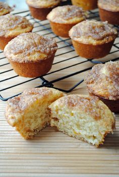 several muffins are cooling on a wire rack