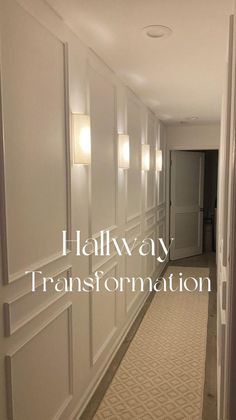 hallway with white walls and beige carpeting