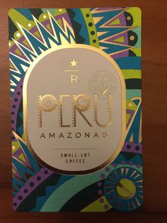 a card with the name peru amazonas in gold foil on top of it