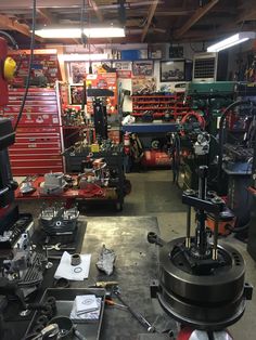 a garage filled with lots of tools and equipment